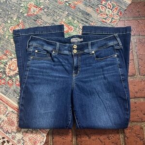 Torrid feel the fit mid rise flare dark wash denim jeans